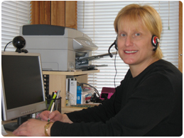 Fayme Filipiak, a certified court interpreter, uses her computer in Madison to appear by live videoconference in a Door County courtroom during a test of long-distance interpretation.