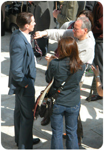 Director Michael Mann selects the perfect tie for film star Christian Bale outside the State Capitol. Bale plays the role of F.B.I. agent Melvin Purvis.