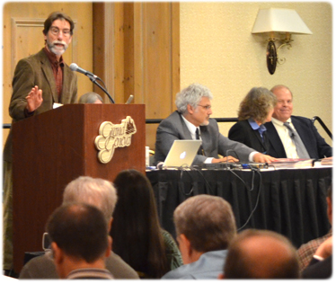 Reserve Judge Edward E. Leineweber discusses Our Courts volunteer opportunities with fellow judges during the 2012 Annual Meeting of the Wisconsin Judicial Conference on Nov. 7 in Lake Geneva.
