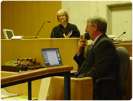 Court Reporter Mark Garvin tests his Stenomask in the Marathon County courtroom of Chief Judge Dorothy L. Bain.