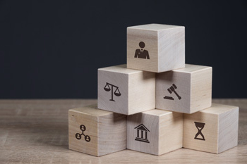 building blocks adorned with court icons