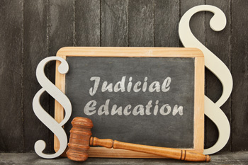 chalboard with 'Judicial Education' written on it