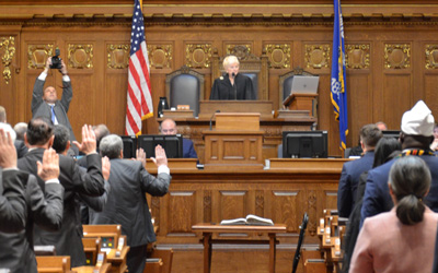 Wisconsin Supreme Court Justice Patience Drake Roggensack takes the dais in the Wisconsin Assembly Chamber to administer the Oath of Office to state representatives
